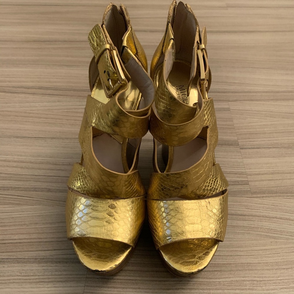 Michael Kors Crisscross gold wedge sandals.